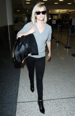 REESE WITHERSPOON Walks Through LAX Airport