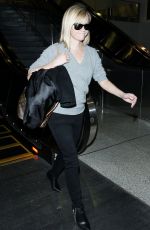 REESE WITHERSPOON Walks Through LAX Airport