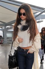 SELENA GOMEZ Arrives at Heathrow Airport in London