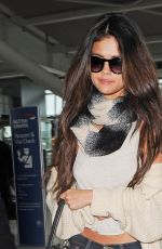 SELENA GOMEZ Arrives at Heathrow Airport in London