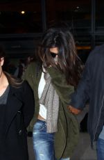 SELENA GOMEZ at Heathrow Airport in London