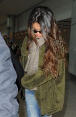 SELENA GOMEZ at Heathrow Airport in London