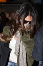 SELENA GOMEZ at Heathrow Airport in London