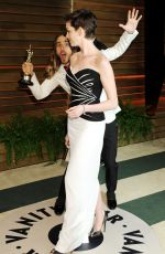 ANNE HATHAWAY at Vanity Fair Oscar Party in Hollywood