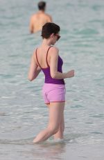 ANNE HATHAWAY in Swimsuit and Shorts in Miami