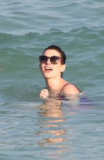 ANNE HATHAWAY in Swimsuit and Shorts in Miami