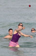 ANNE HATHAWAY in Swimsuit and Shorts in Miami