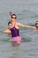 ANNE HATHAWAY in Swimsuit and Shorts in Miami