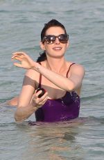 ANNE HATHAWAY in Swimsuit and Shorts in Miami