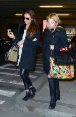 ASHLEY BENSON and SHAY MITCHELL Arrives at JFK Airport in New York