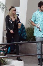 ASHLEY BENSON in jeans Out Shopping in Hollywood