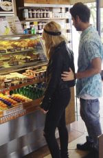 ASHLEY BENSON in jeans Out Shopping in Hollywood