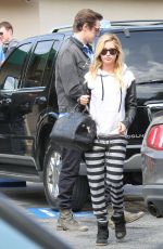 ASHLEY TISDALE Leaves Hugo