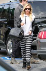 ASHLEY TISDALE Leaves Hugo
