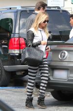 ASHLEY TISDALE Leaves Hugo