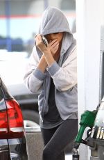 CHARLIEZE THERON at Gas Station after a Yoga Class in Los Angeles