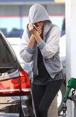 CHARLIEZE THERON at Gas Station after a Yoga Class in Los Angeles