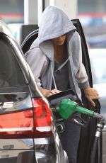 CHARLIEZE THERON at Gas Station after a Yoga Class in Los Angeles