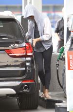 CHARLIEZE THERON at Gas Station after a Yoga Class in Los Angeles
