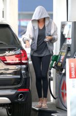 CHARLIEZE THERON at Gas Station after a Yoga Class in Los Angeles