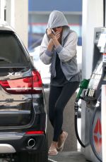 CHARLIEZE THERON at Gas Station after a Yoga Class in Los Angeles