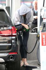 CHARLIEZE THERON at Gas Station after a Yoga Class in Los Angeles