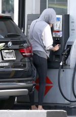 CHARLIEZE THERON at Gas Station after a Yoga Class in Los Angeles