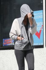 CHARLIEZE THERON at Gas Station after a Yoga Class in Los Angeles