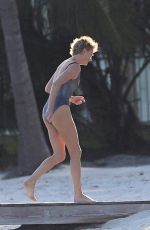 CHARLIZE THERON at a Photoshoot in Miami Beach