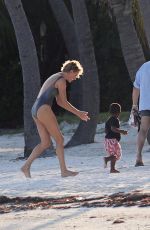 CHARLIZE THERON at a Photoshoot in Miami Beach