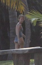 CHARLIZE THERON at a Photoshoot in Miami Beach