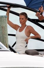 CHARLIZE THERON at a Photoshoot in Miami Beach