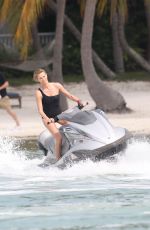 CHARLIZE THERON in Swimsuit at a Photoshoot in Miami