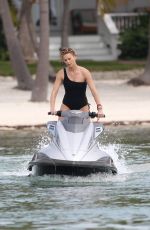 CHARLIZE THERON in Swimsuit at a Photoshoot in Miami