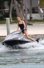 CHARLIZE THERON in Swimsuit at a Photoshoot in Miami