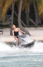 CHARLIZE THERON in Swimsuit at a Photoshoot in Miami