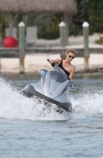 CHARLIZE THERON in Swimsuit at a Photoshoot in Miami