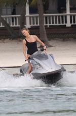 CHARLIZE THERON in Swimsuit at a Photoshoot in Miami