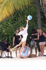 CHARLIZE THERON in Swimsuit at a Photoshoot in Miami