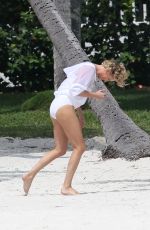 CHARLIZE THERON in Swimsuit at a Photoshoot in Miami