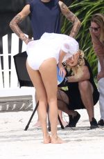 CHARLIZE THERON in Swimsuit at a Photoshoot in Miami