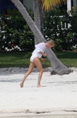 CHARLIZE THERON in Swimsuit at a Photoshoot in Miami