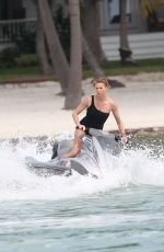 CHARLIZE THERON in Swimsuit at a Photoshoot in Miami