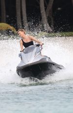 CHARLIZE THERON in Swimsuit at a Photoshoot in Miami