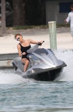 CHARLIZE THERON in Swimsuit at a Photoshoot in Miami