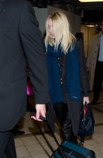 DAKOTA FANNING at LAX AIrport 0305