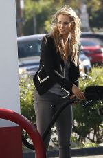 ELIZABETH BERKLEY at a Gas Station in Los Angeles