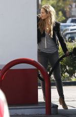 ELIZABETH BERKLEY at a Gas Station in Los Angeles