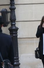 ELIZABETH OLSEN and Boyd Holbrook Out in Paris