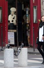 ELIZABETH OLSEN and Boyd Holbrook Out in Paris